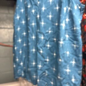 Torrid Blue Tank with White Starburst Design